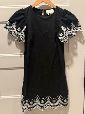 kate spade cream and black logo label